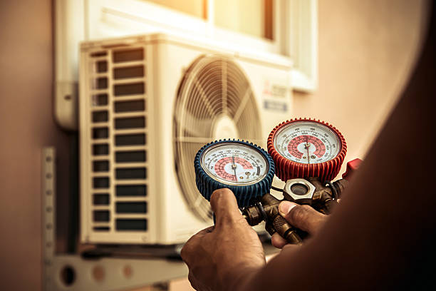 Professional Air Conditioning Service technician working in Earlimart, CA